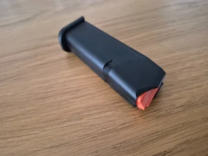 GLOCK magazynek 17 pomarańczowy donośnik